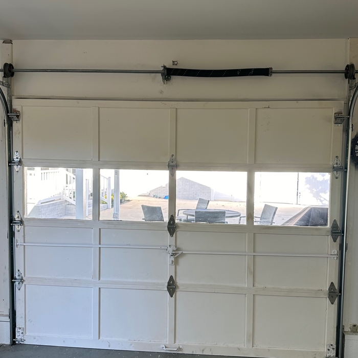 Door With Torsion Spring System Installed