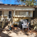 Before both sets of steps to the porch were removed
