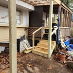 The Stairs to the side entrance,
Along with posts set for support on the awning spaced out 6 ft from one another. 3 post used for support.