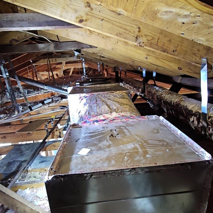 Longview of new furnace return plenum and ductwork reinsulated and sealed
