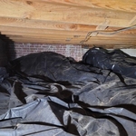 High mound of dirt under addition