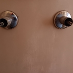 Replace and repair bathroom faucets and reset toilet