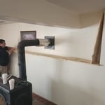 Steve measuring and installing wood