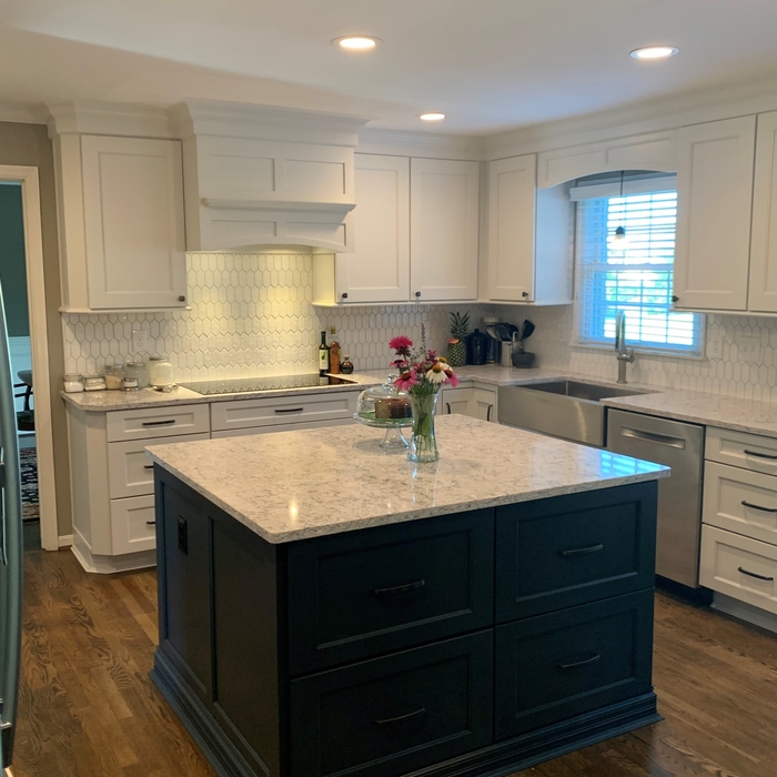 Beautiful oyster white cabinets, blue island cabinetry with eased edge quartz countertop