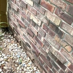 (Before Image) Bowed and cracked foundation wall