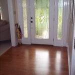 Foyer afterwards with hardwood floor install.