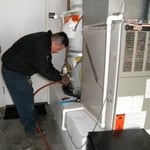 Our technician Fabian getting ready to drain a water heater.