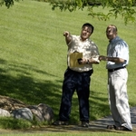 ISA Certified Arborist, Rich Bergland, with a client of The Care of Trees.