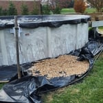 Laying the 6 Mil Plastic for the Weed & Water Control around the Pool for the Commercial Black Border Outline Landscaping Project