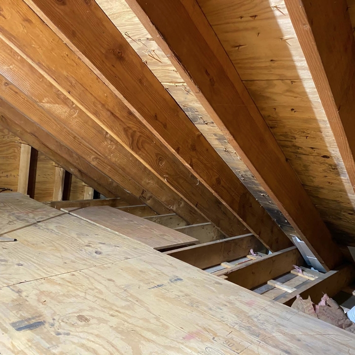 Conditions that may lead to indoor mold growth. I noted the following observations:
• There was no noticeable odor in the attic.
• The condition of the rafters, gable walls and plywood flooring was clean and clear,
• The attic floor contained fiberglass batt insulation, to a depth approx. the height of the 2 x 6 joists,
• There were baffles in place at joist cavities, which had separated the insulation from the roof, to allow air passage at the eaves,
• There was black discoloration o