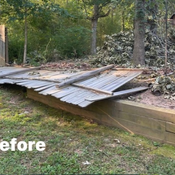 Before photo of storm damaged privacy fence