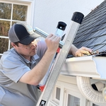 Windward's Skilled Technician performing an exterior inspection.
