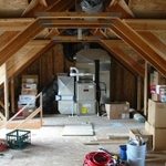 This large unfinished attic needed extensive framing in order for drywall to be applied to the ceilings and walls