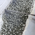 Weep Hole Drilling - Allow water to escape the hollow cores inside a concrete block wall.