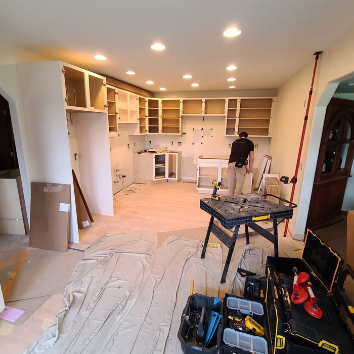 Cabinet installation in progress.