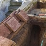 Hand Digging under a cement walkway. Could not get a machine in that tight spot.