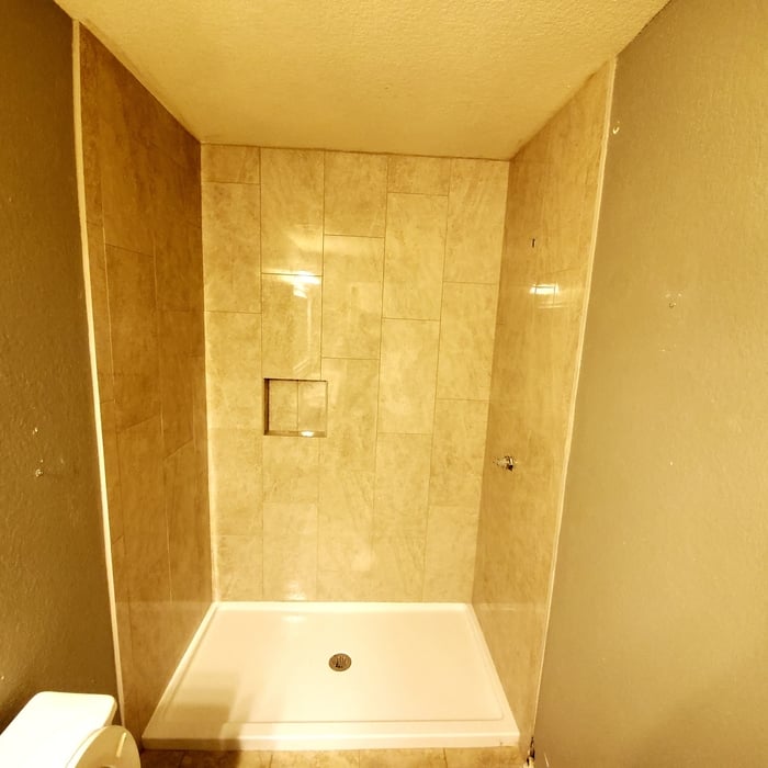 Tile installation complete without fixtures.
