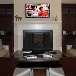 TV above an existing fireplace