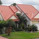 Metal shingles that look like real clay tiles. The color will last forever and the shingles will stand up to 200mph winds!