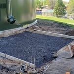 Leveling gravel and forming pad