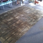 Silk rug after weeks of gentle cleaning to remove difficult dye stain