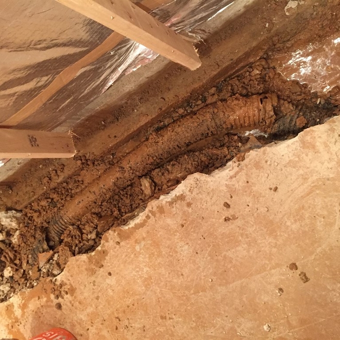 These 4 inch builder installed drain pipe are very often misinstalled and need either service or replacement. This pipe is only 6 years old and was totally clogged with mud.