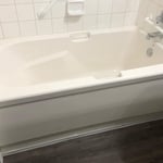 Deep soaking tub but hard to step over sidewalls