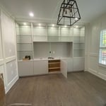 Once the cabinet and shelves were installed, we came back and used a laser leveling tool to make sure the TV was installed perfectly.