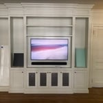 Client had built-in cabinets installed in their remodeled living room and we installed the Samsung FrameTV and Sonos Arc.