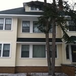 After - new vinyl siding, soffit and trim