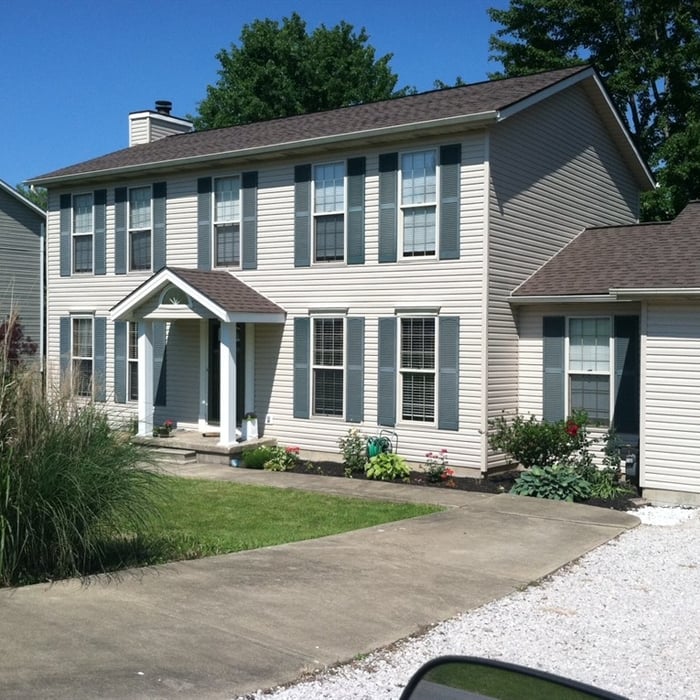 After portico, siding, and roof