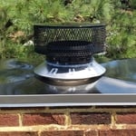 Stainless steel chase cover and storm collar replacement, sealed into place using high end expandable sealant. OEM cap and exposed flue liner refinished using rust preventative paint.