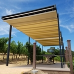 Retractable free-standing water proof commercial grade pergola