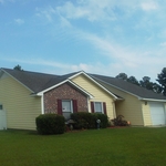 replaced roof and installed shake vinyl siding.