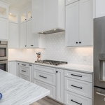 Coastal Kitchen ft. White and Haze Cabinets