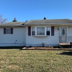This is the before pic it was old vinyl siding.