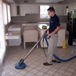 High pressure rinse blast soils from the grout lines.