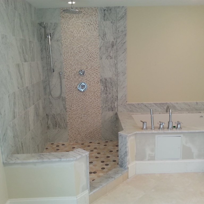 Marble bathroom walls.