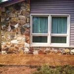 This is a matching stamp sidewalk to the house color, with stone slate texture.