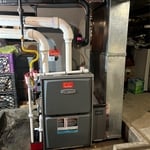 95% efficient furnace installation in resident basement