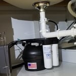 Small undercounter drinking water purifier. Reverses Osmosis water pressure delivery - high efficiency!