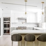 Kitchen - Modern Style, Gold Light Pendants, Marble Countertop, Double-Oven, Built-in Microwave, Pantry.