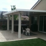 Patio Cover with recessed lighting and a fan.