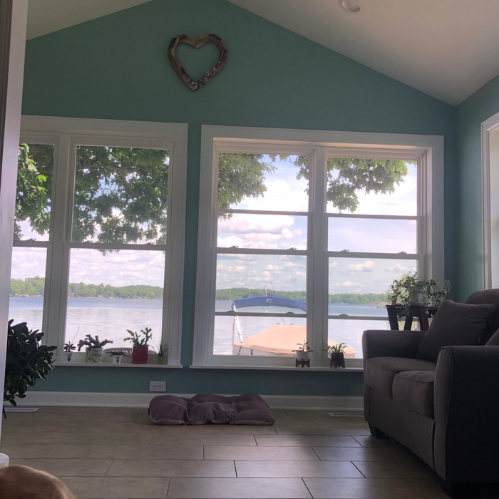 Lots of windows for lake views; Vaulted ceiling and tile floor