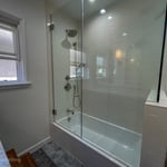 Shower shifted to window wall to allow enough space for a shower/tub