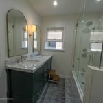 New dual sink vanity, tile & shower/bath
