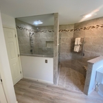 After shower and wet area with seat and heated towel rack.