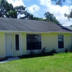Another picture of front of home before cleaning