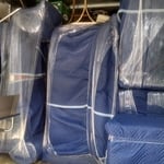 Padded and shrink wrapped sofas