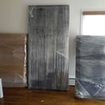 Wrapped furniture ready to be loaded.